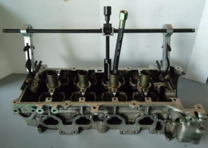 Рассухариватель клапанов универсальный с поворотными стойками KA-2057 , набор 9 предметов ka-2057