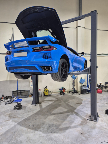 Подъемник двухстоечный 4 т, верхняя синхронизация, с электростопорами, H=4 м, 380 В, серый n4120h1e-4g